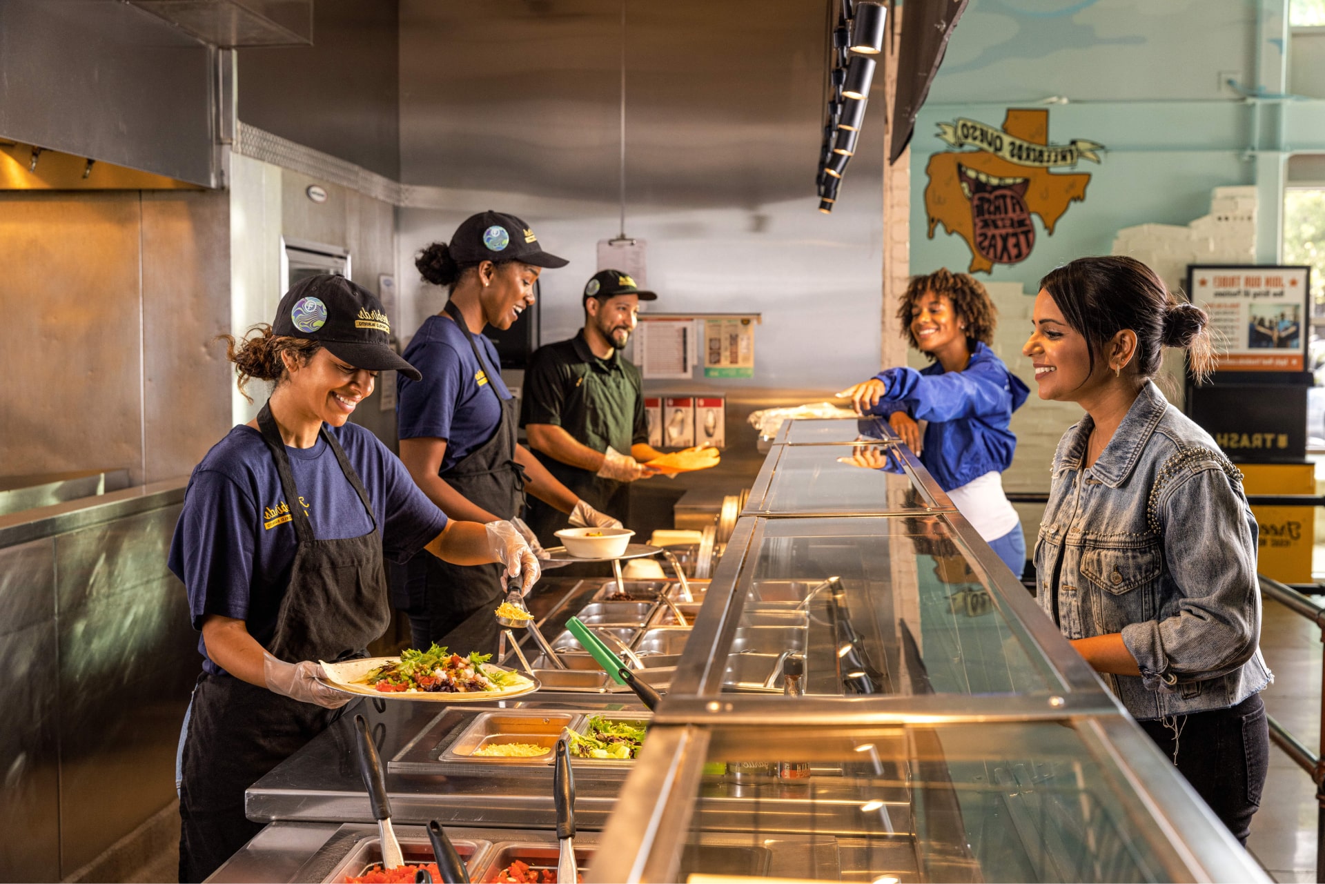 Freebirds employees serving customers